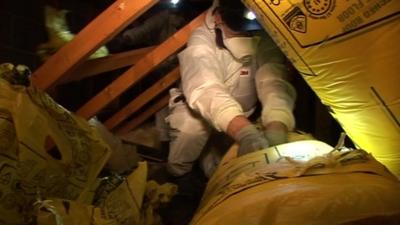 A workman in a loft