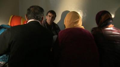 Civilians talk to the BBC's Wyre Davies