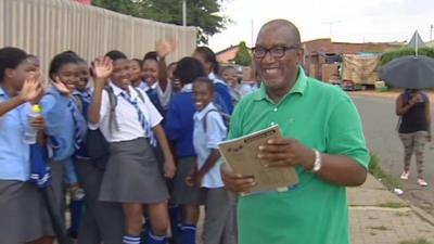 Sipho "Hotstix" Mabusay going to school