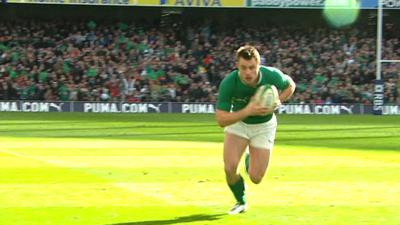 Ireland's Tommy Bowe scores a try against Italy