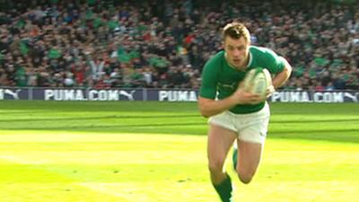 Ireland's Tommy Bowe scores a try against Italy