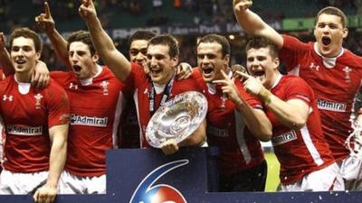 Wales celebrate victory at Twickenham