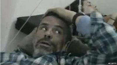 Paul Conroy in hospital bed - from video posted online