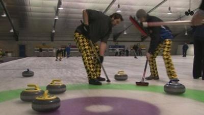 Curlers on the ice