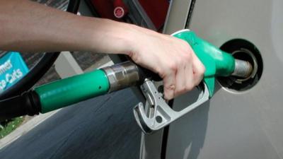 Filling a car with petrol