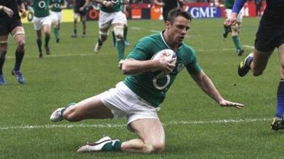 Ireland's Tommy Bowe scores his second try against France