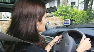 Woman driving a car