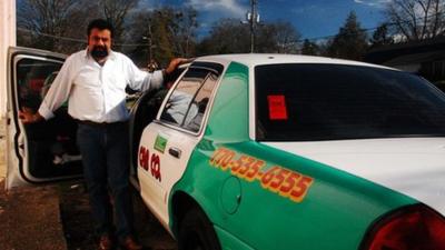 Jose Luis Diaz and his cab