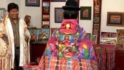 Bolivian woman wearing painted shawl