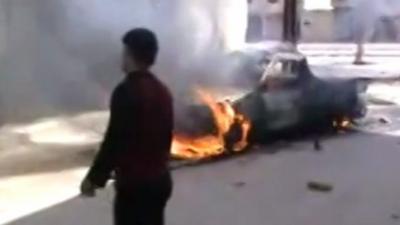 Burning car in Homs