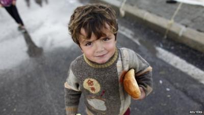 Boy refugee at camp on Turkish-Syrian border