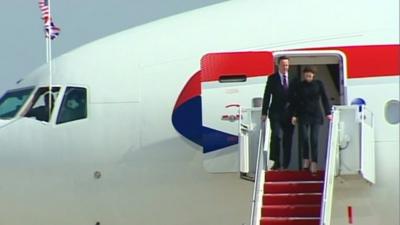 David Cameron and his wife, Samantha, arrive in Washington in the US