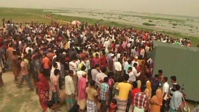 People waiting for news of rescue and recovery operation