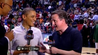 David Cameron and Barack Obama give an American network a joint TV interview at half time.