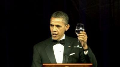 President Barack Obama raises a glass to the Queen.