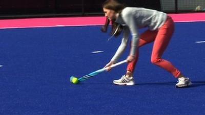 Kate Middleton plays hockey