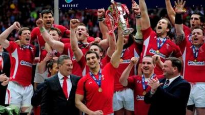 Welsh captain Sam Warburton lifts the Six Nations trophy