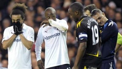 Tottenham and Bolton players look distraught