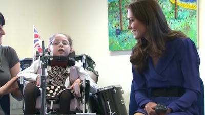 The Duchess of Cambridge taking part in a music making session