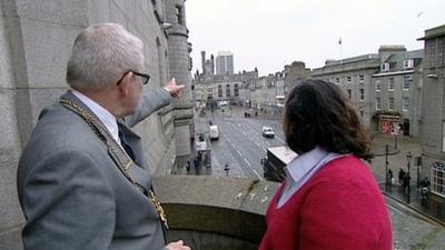 Aberdeen Lord Provost Peter Stephen and torchbearer Morgan Tunney