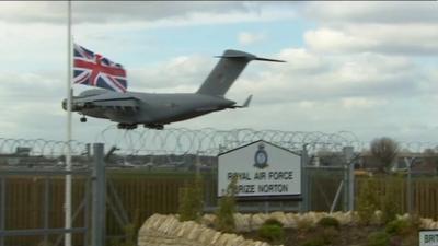 Plane carrying the soldiers coming in to land