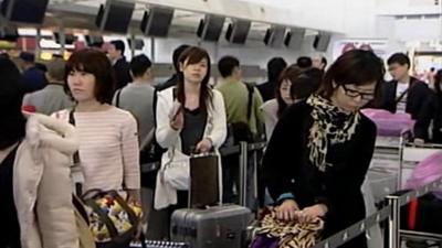 Passengers at Hong Kong airport