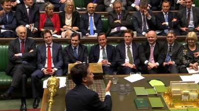 Labour leader Ed Miliband puts a question on income tax to the cabinet