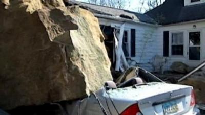 Fallen boulder damages car in Ohio