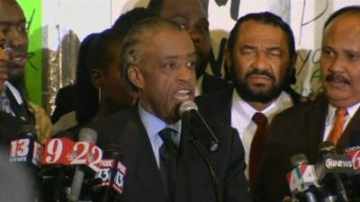 Reverend Al Sharpton speaks to a rally