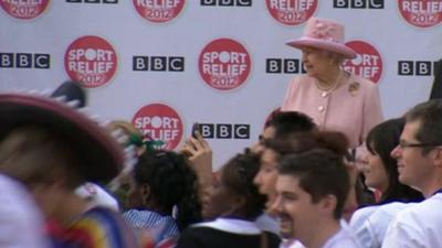 The Queen watching BBC staff running the Sport Relief mile in Salford