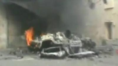 Burning car in Homs