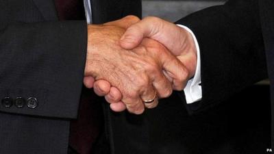 two men shaking hands