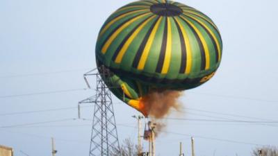 A hot-air balloon crashed into power lines in Northamptonshire