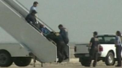 Pilot who suffered a "medical situation" being removed from plane.