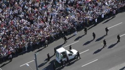 The popemobile arrives in Havan's Revolution Square