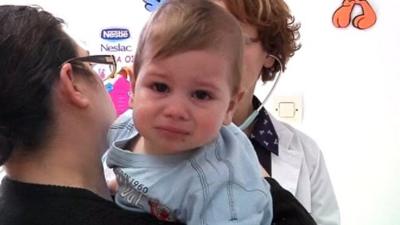 A young boy is seen at the Doctors of the World clinic