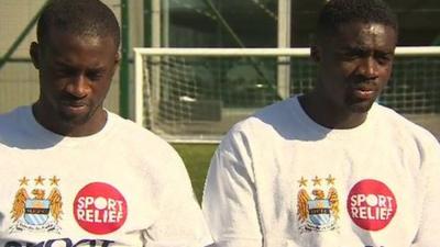 Manchester City players Yaya Toure (left) and Kolo Toure