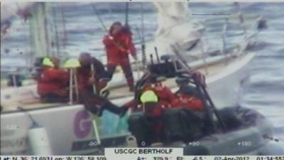 Two of the crew are rescued by the coastguard