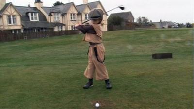 Boy playing golf in Montrose