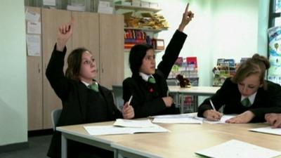 Students in Sirius Academy's reading help class