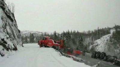 Truck on a cliff edge