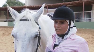 A female palestinian horse rider