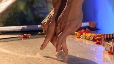 A pair of hands in the Belgian play