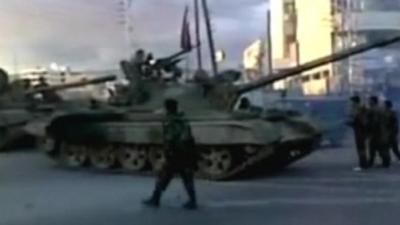 Syrian tanks and troops