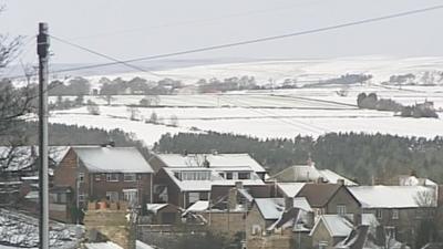 Snow covered houses