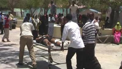 Injured person on a stretcher in Mogadishu