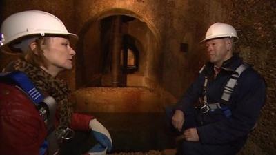 Two people studying the ground water supply