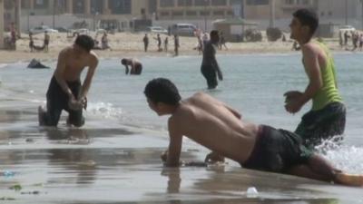 Young Libyans on a beach