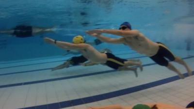 Swimmers participating in the plunge