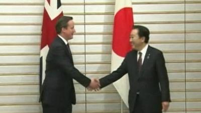 British Prime Minister David Cameron shakes hands with Japanese Prime Minister Yoshihiko Noda